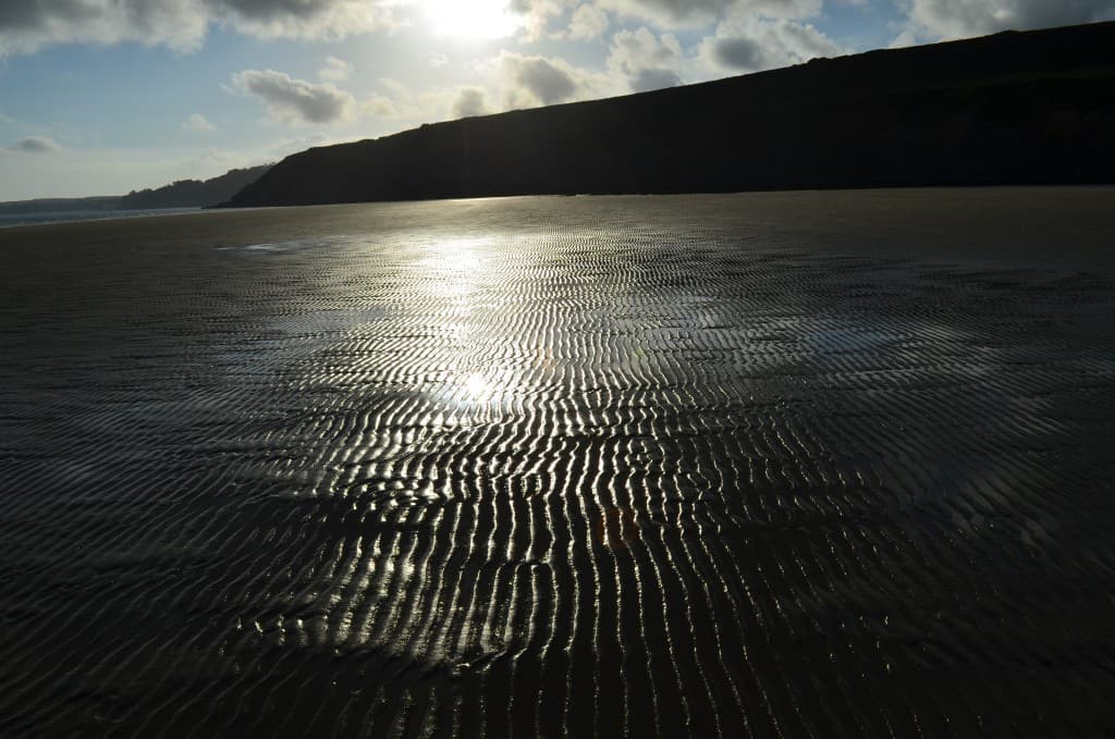 Plage au soleil couchant